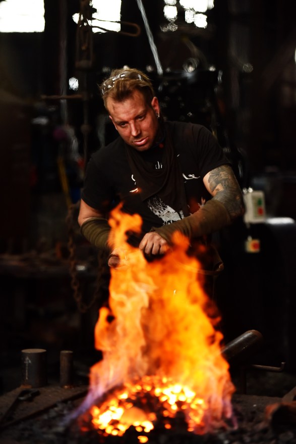 Resident blacksmith, Peter Mattila, hard at work at QVMAG.